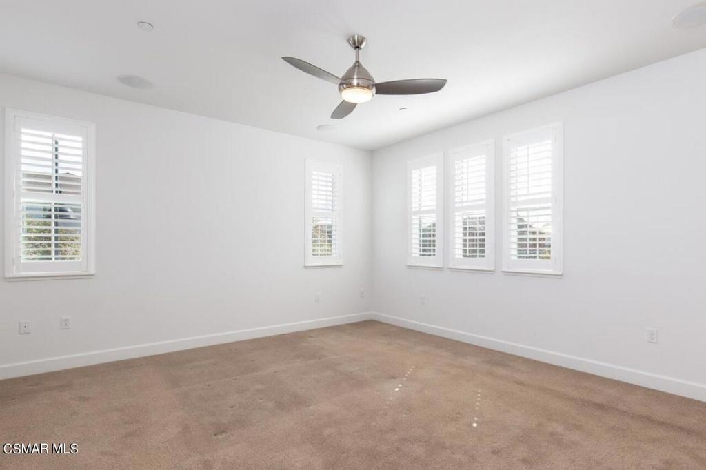 217 9th Street Marina, CA 93933 - Photo 13 of 17 an empty room with windows and ceiling fan