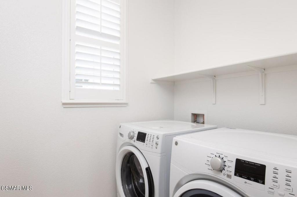 217 9th Street Marina, CA 93933 - Photo 15 of 17 a utility room with dryer and washer