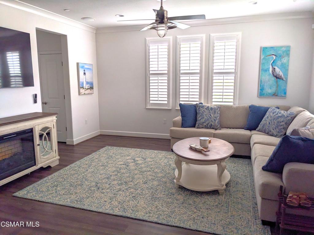 217 9th Street Marina, CA 93933 - Photo 3 of 17 a living room with furniture and a fireplace