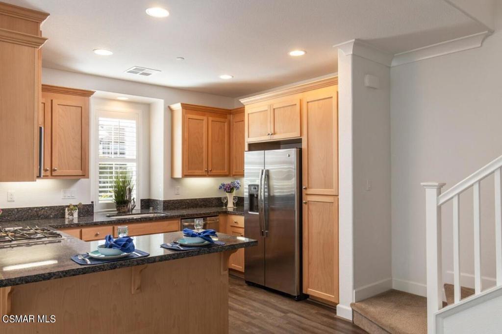 217 9th Street Marina, CA 93933 - Photo 5 of 17 a kitchen with refrigerator and window