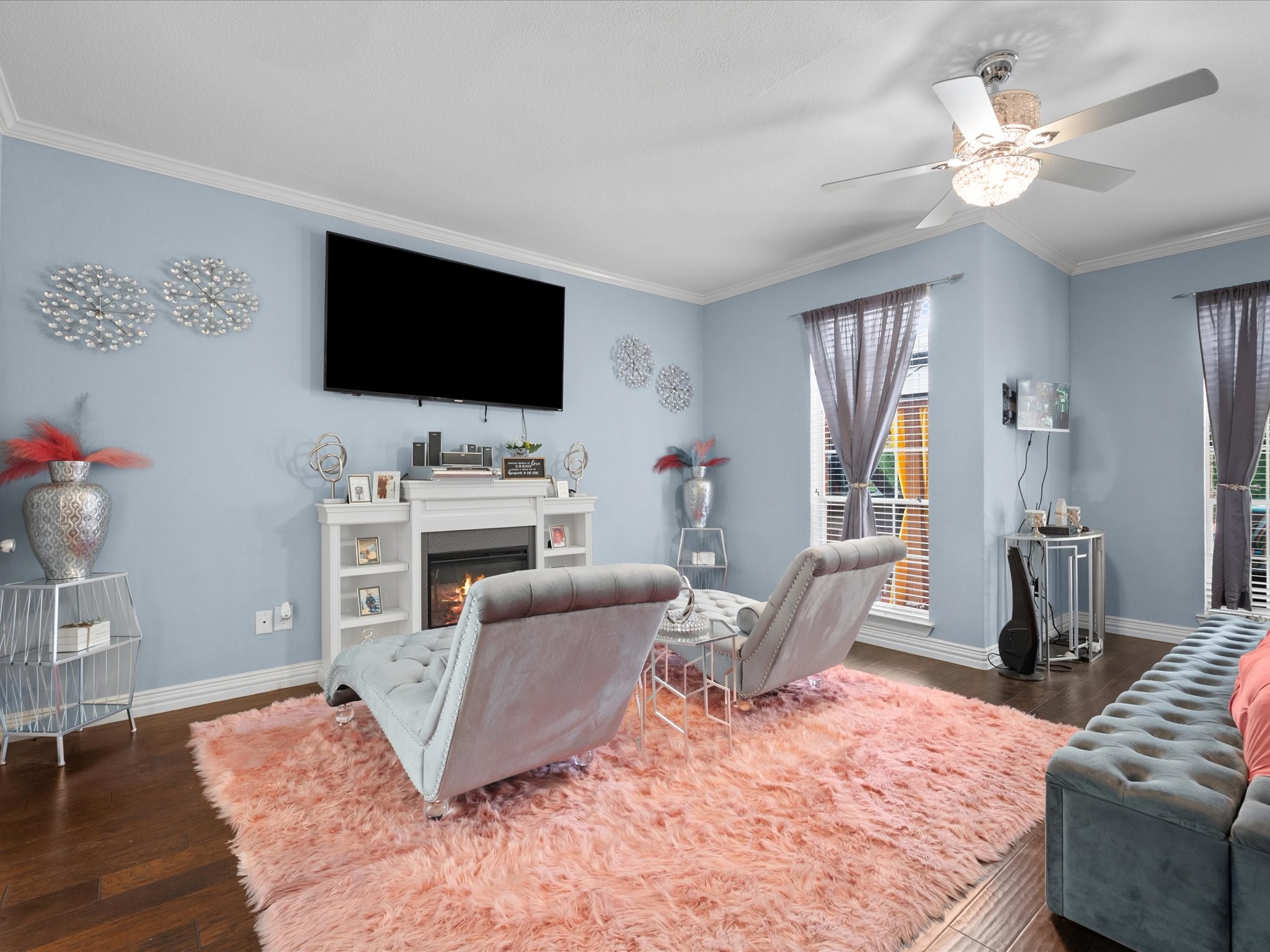 16123 Lafone Drive Spring, TX 77379 - Photo 19 of 47 Complete with its own fireplace, the private sitting area creates a peaceful retreat—perfect for unwinding at the end of the day with a favorite book or morning coffee.