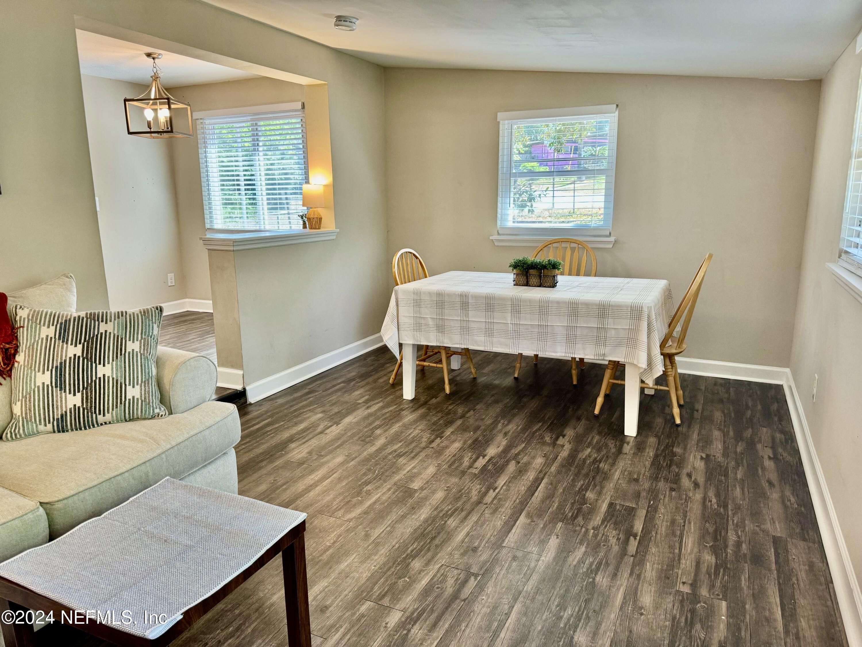 398 Gwinnett Road Orange Park, FL 32073 - Photo 19 of 40 a living room with furniture and a wooden floor