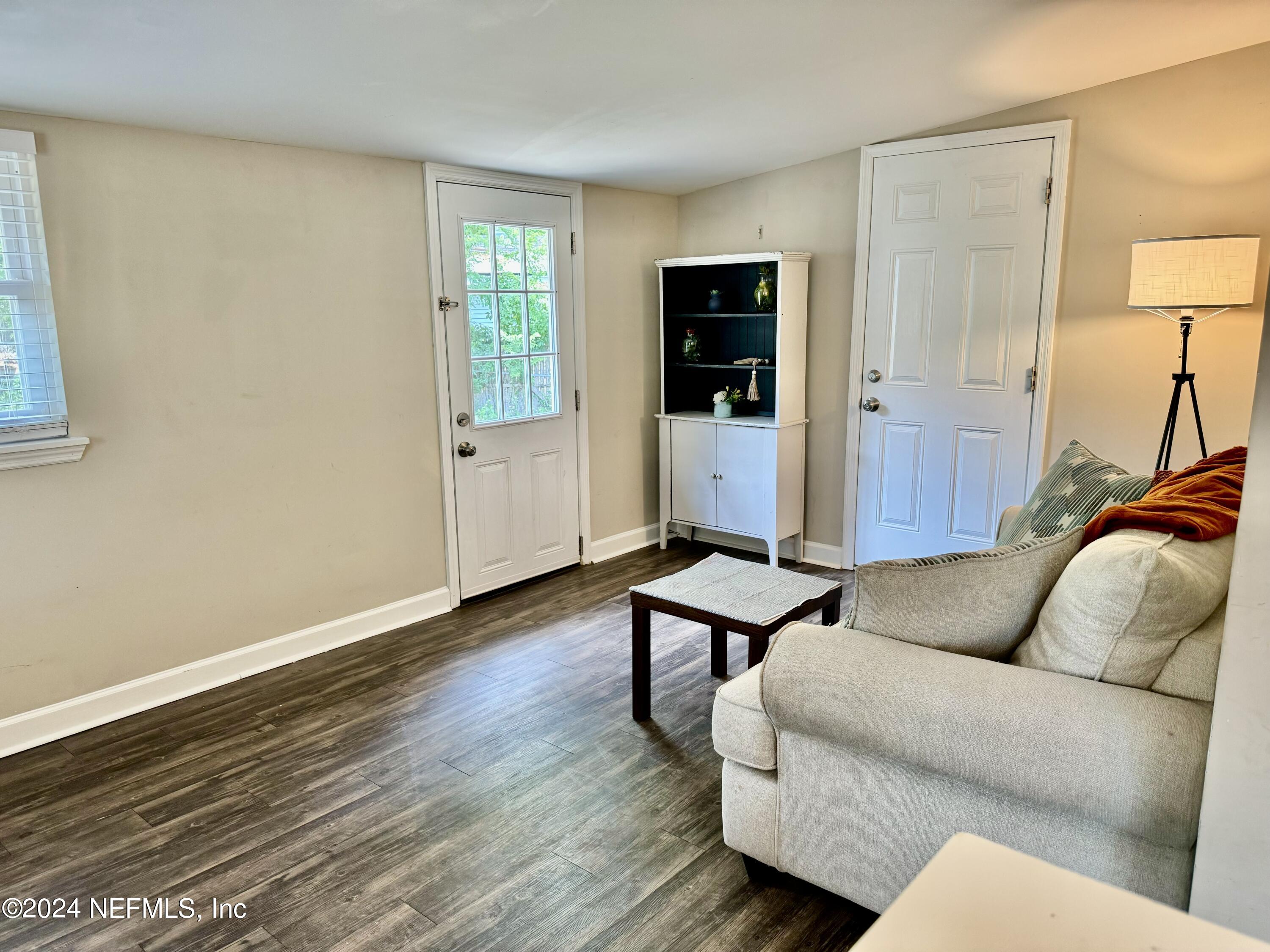 398 Gwinnett Road Orange Park, FL 32073 - Photo 21 of 40 a living room with furniture and a window