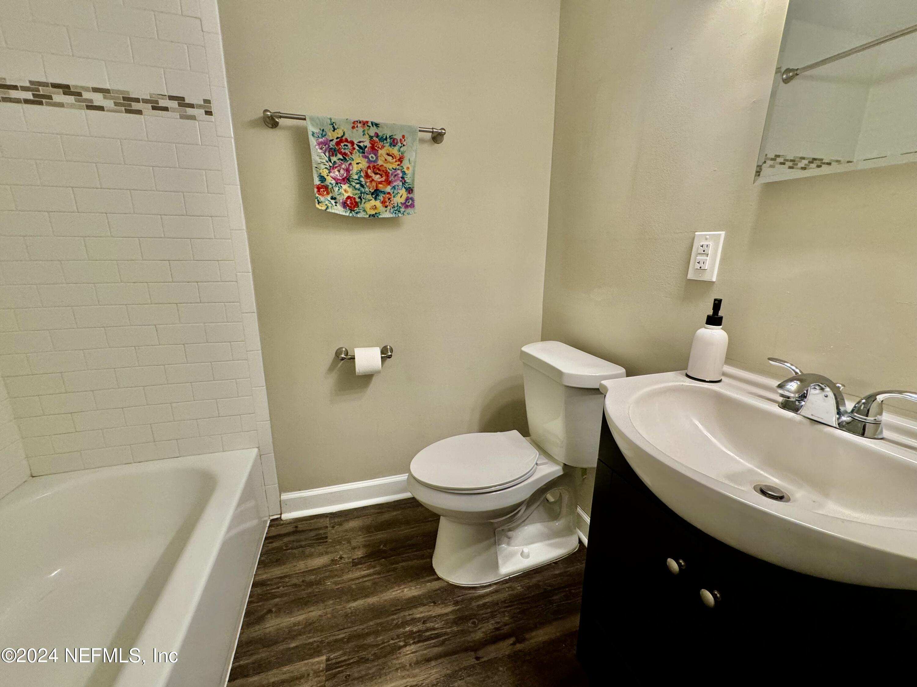 398 Gwinnett Road Orange Park, FL 32073 - Photo 25 of 40 a bathroom with a sink and a toilet
