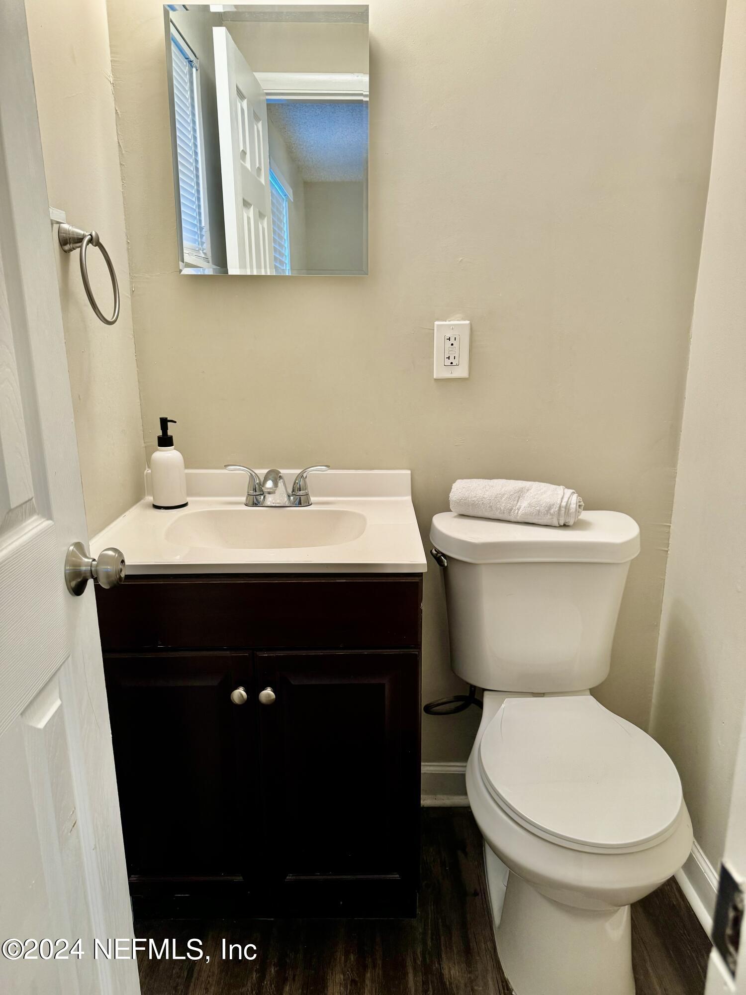 398 Gwinnett Road Orange Park, FL 32073 - Photo 29 of 40 a bathroom with a sink and a toilet