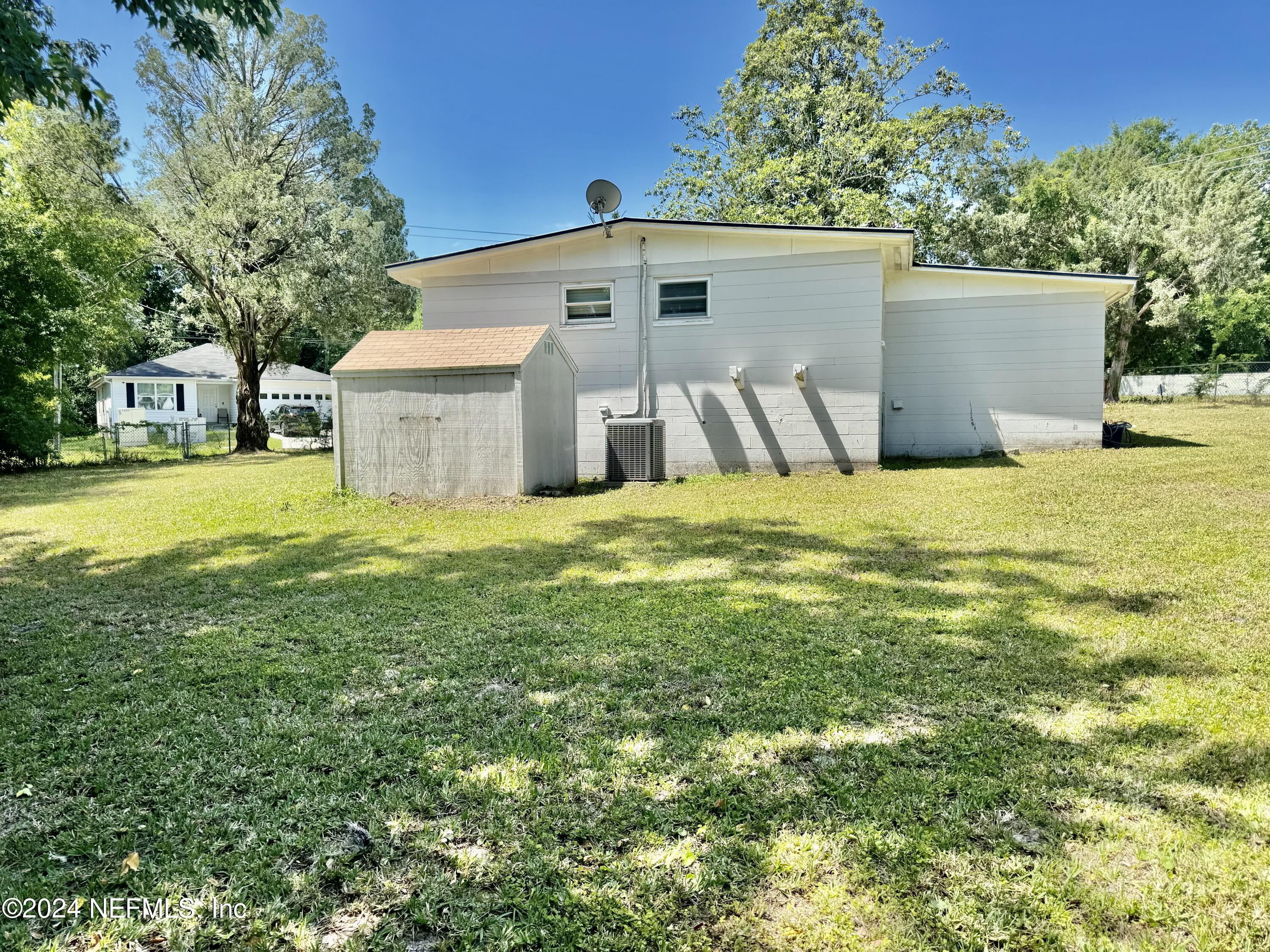 398 Gwinnett Road Orange Park, FL 32073 - Photo 38 of 40 a view of a house with a yard