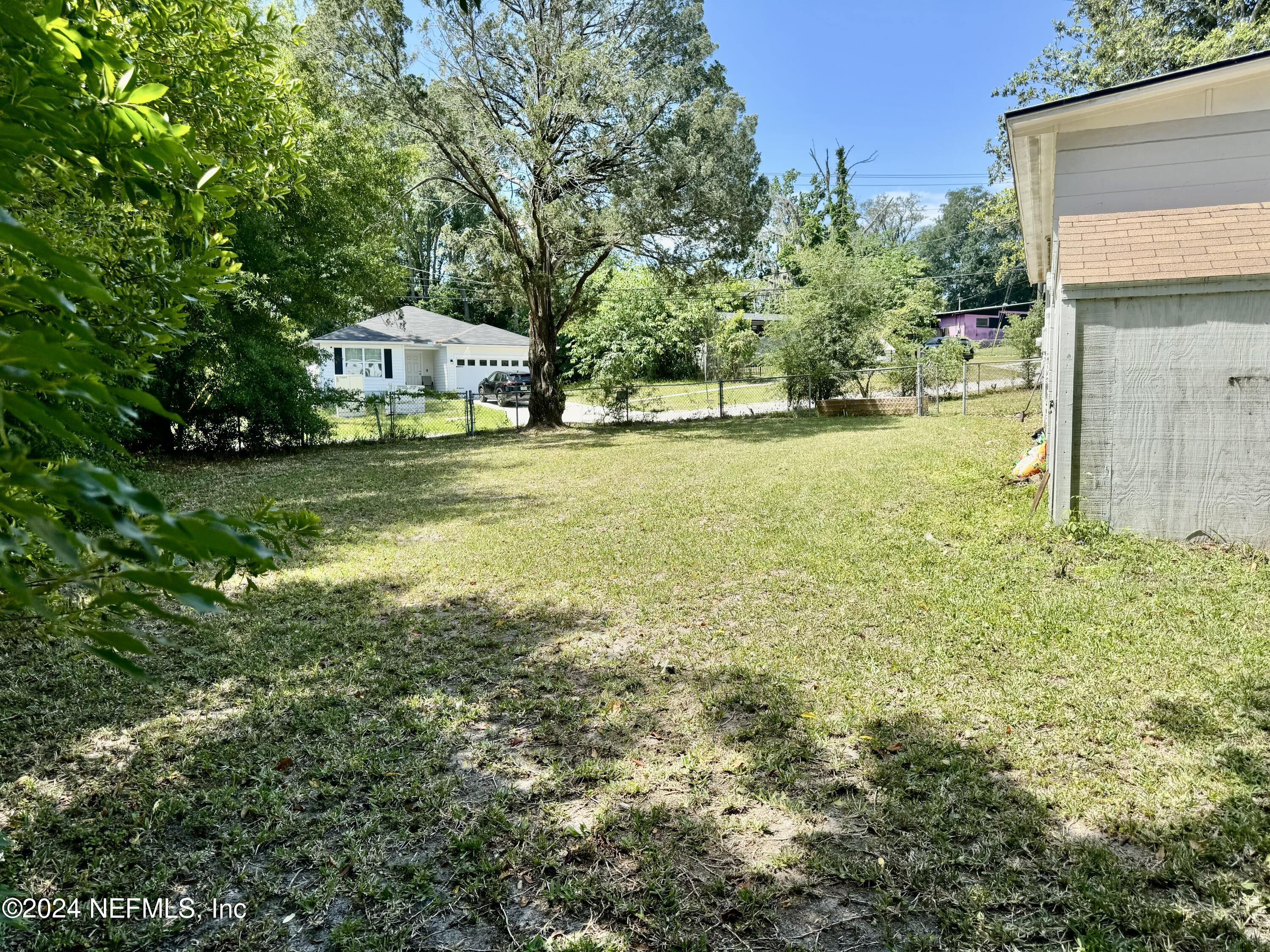 398 Gwinnett Road Orange Park, FL 32073 - Photo 39 of 40 a view of a house with a yard
