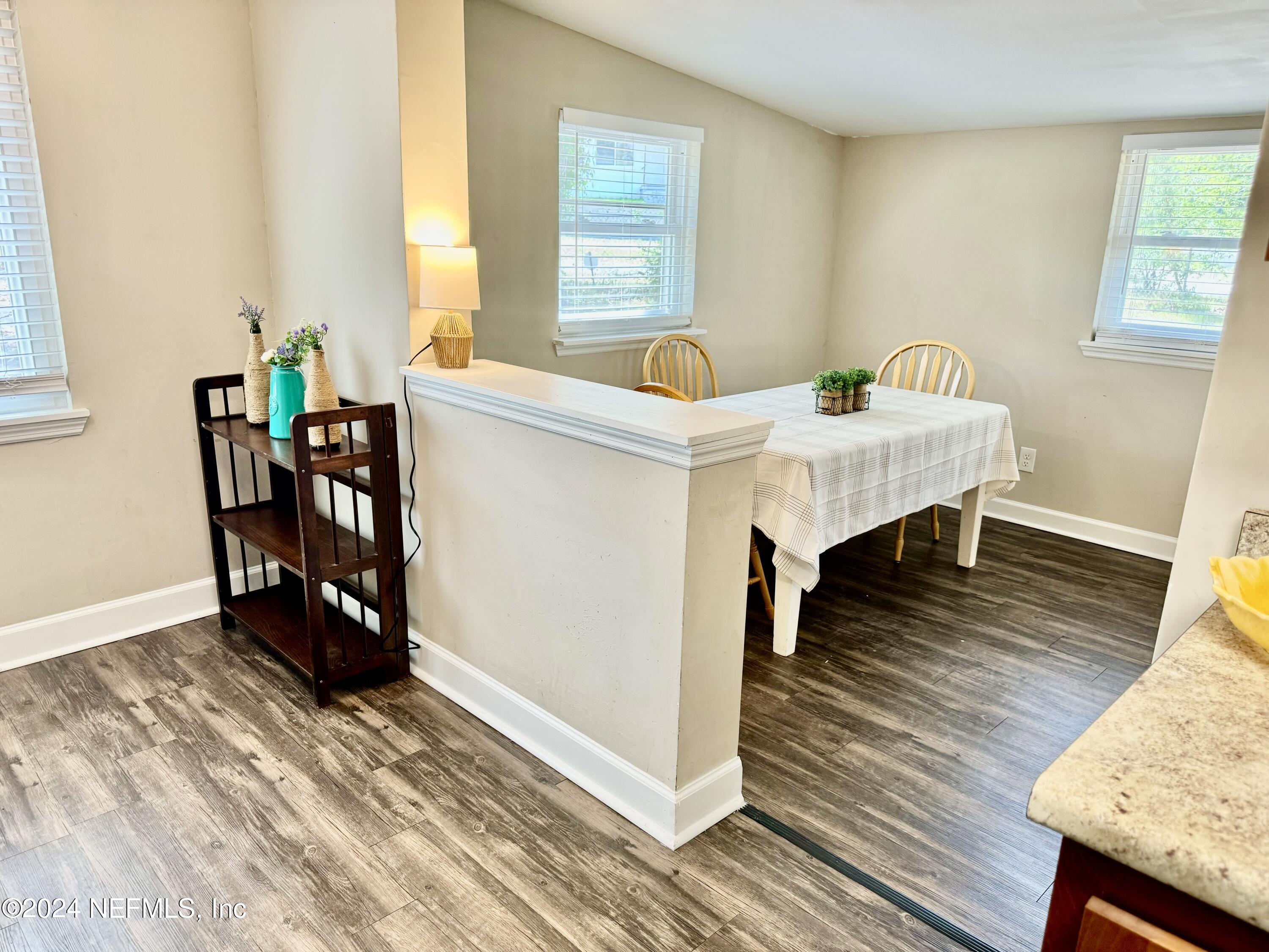 398 Gwinnett Road Orange Park, FL 32073 - Photo 9 of 40 a living room with furniture and a wooden floor
