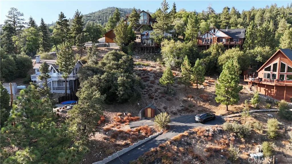 0 Ridge Fawnskin Ca Fawnskin, CA 92333 - Photo 4 of 5 a view of a houses with a yard