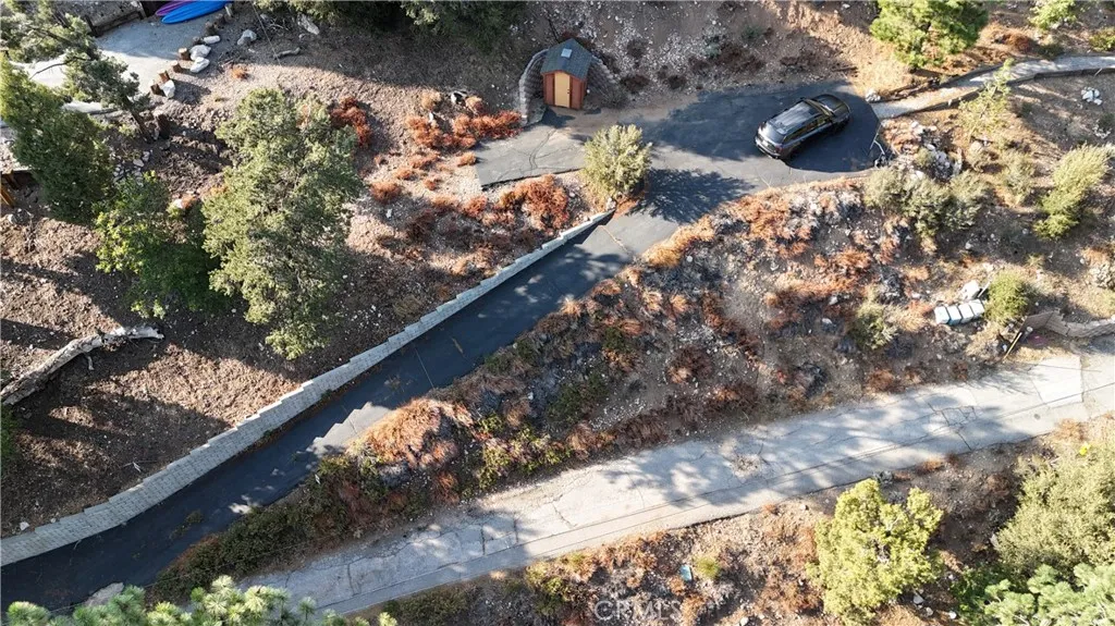0 Ridge Fawnskin Ca Fawnskin, CA 92333 - Photo 5 of 5 a view of a tree with a yard