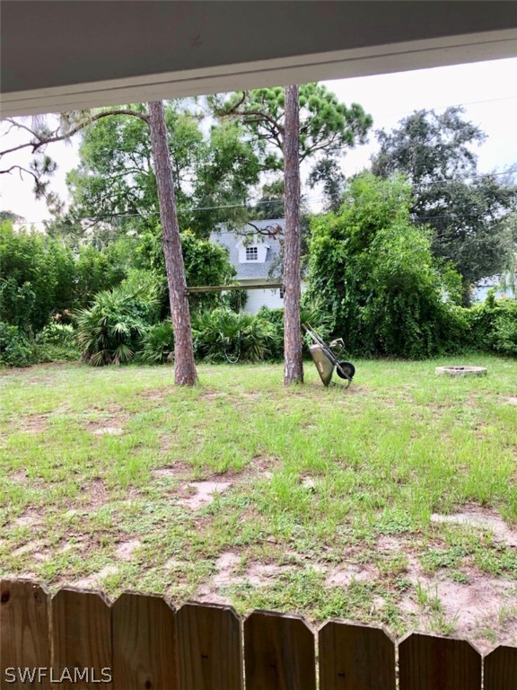 8133 Albatross Road Fort Myers, FL 33967 - Photo 13 of 14 a view of a garden from a window