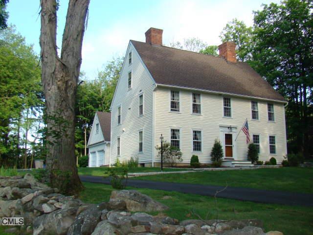63 Deer Hill Road Redding, CT 06896 - Photo 1 of 1 a view of a white house with a big yard and potted plants