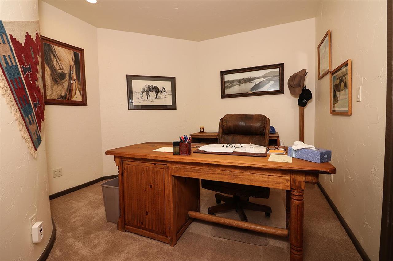 2025 L Road Fruita, CO 81521 - Photo 18 of 42 a view of a workspace with furniture