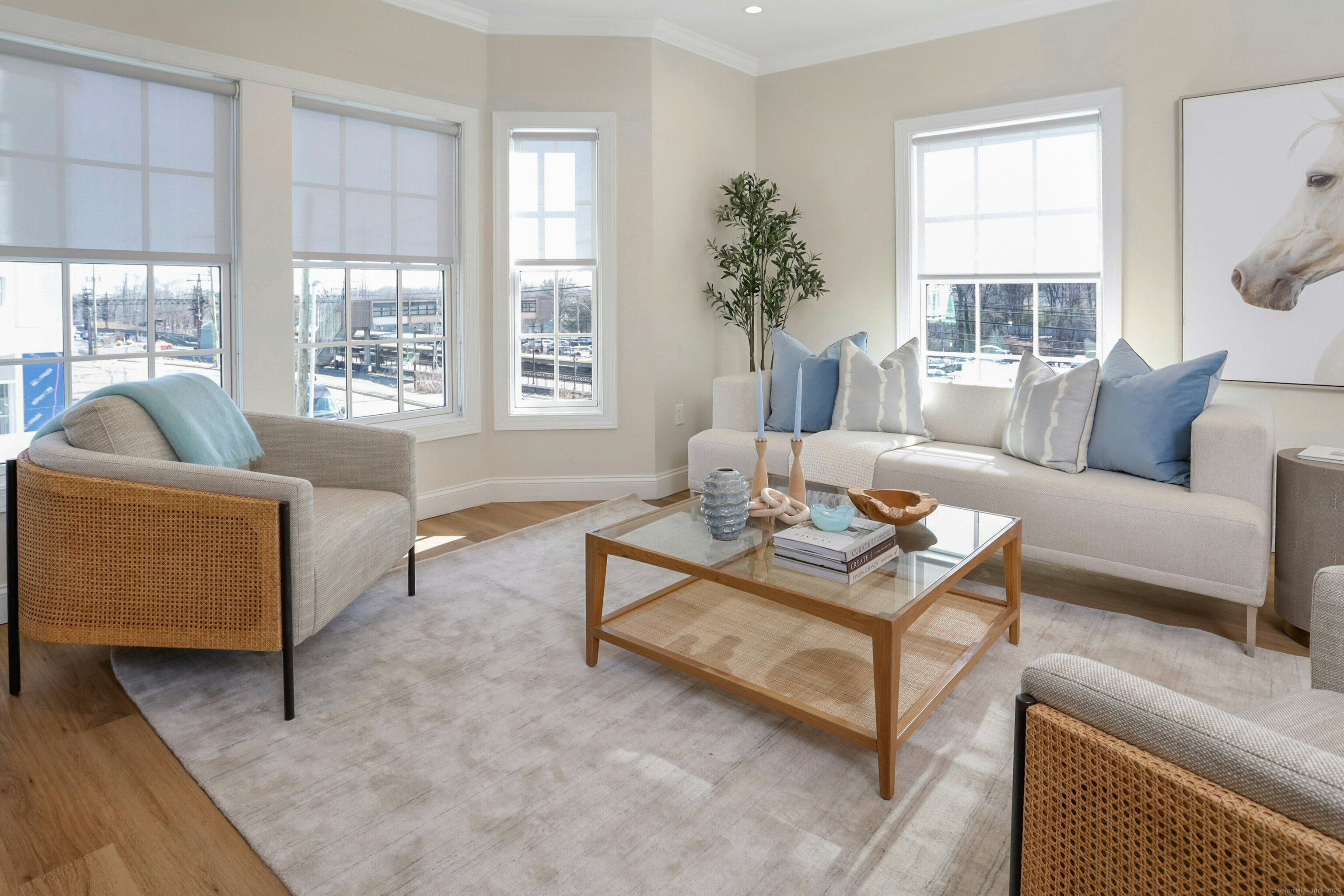 440 Heights Road, Unit 210 Darien, CT 06820 - Photo 2 of 15 a living room with furniture and a large window