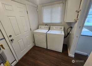 12524 Addison Street Southwest Lakewood, WA 98499 - Photo 18 of 20 a view of a storage and utility room with a sink