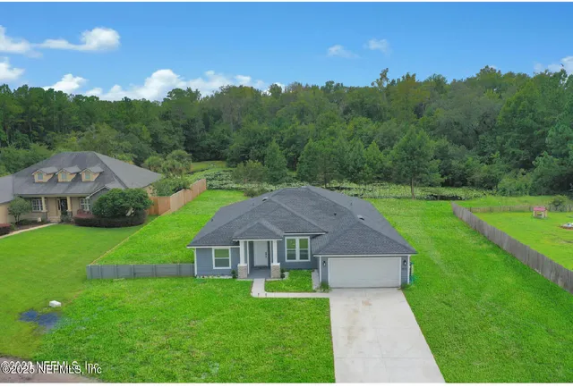 view of a house with a big yard