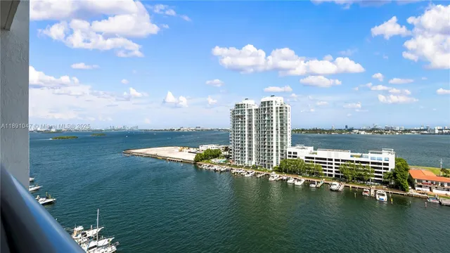 a view of a lake with a city