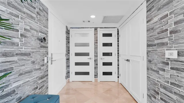 a view of a bathroom with a shower and a sink