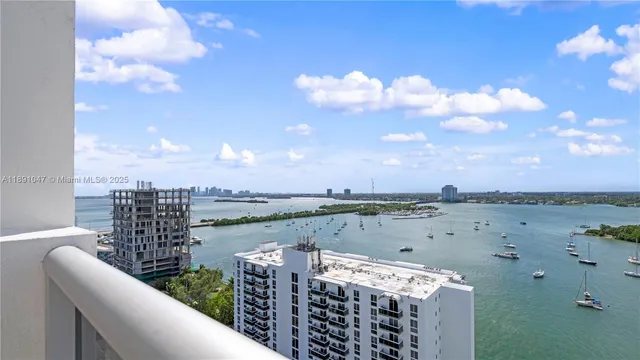 a view of a city and lake