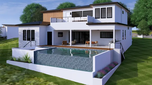 a view of a house with a yard patio and a fire pit