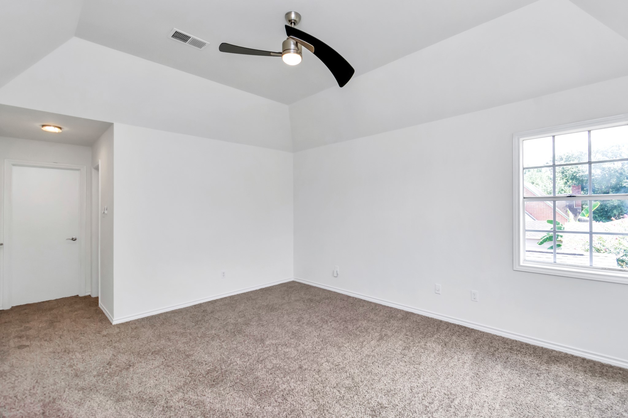 12818 Chamberlain Drive Houston, TX 77077 - Photo 20 of 32 wooden floor in an empty room with a window