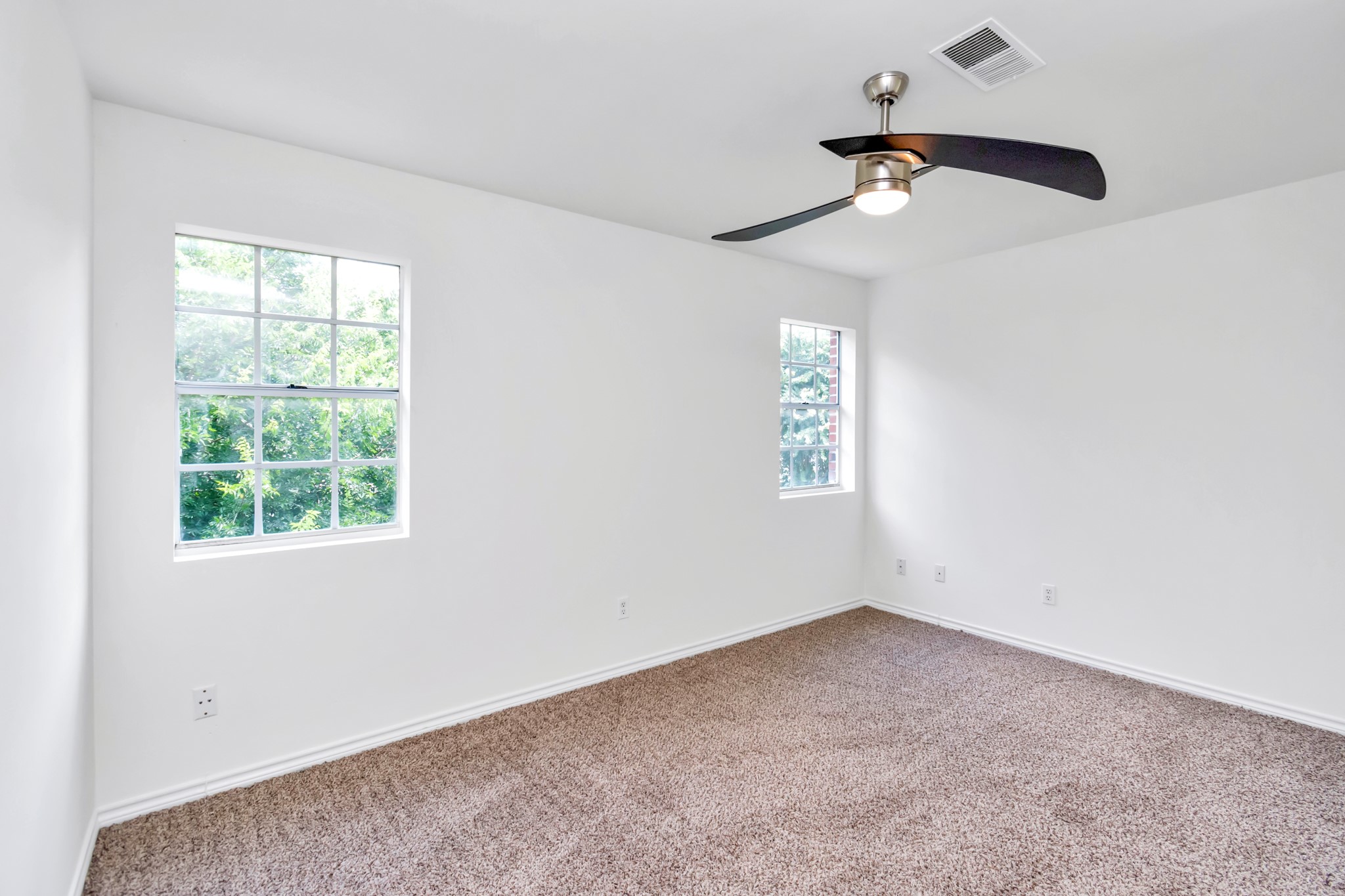 12818 Chamberlain Drive Houston, TX 77077 - Photo 26 of 32 an empty room with a window
