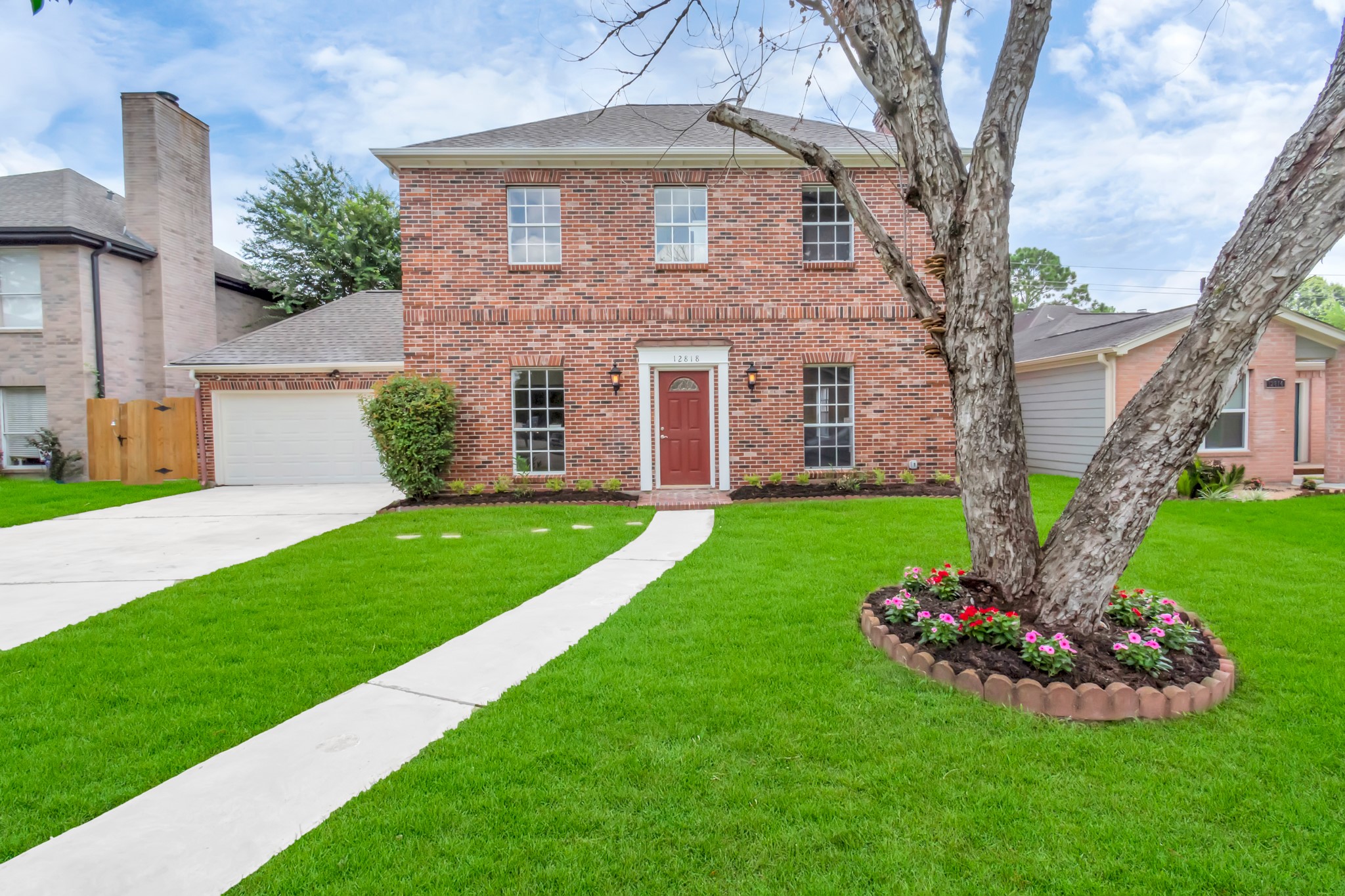 12818 Chamberlain Drive Houston, TX 77077 - Photo 3 of 32 a view of a house with a yard