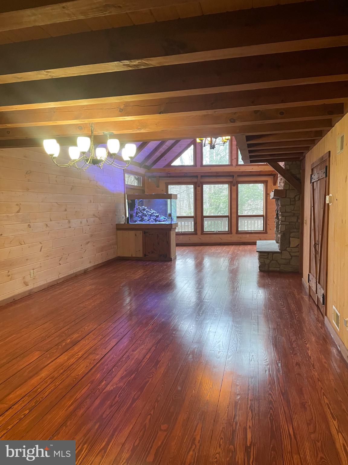 506 Hemlock Lane Lebanon, PA 17042 - Photo 11 of 63 a view of empty room with wooden floor and fan