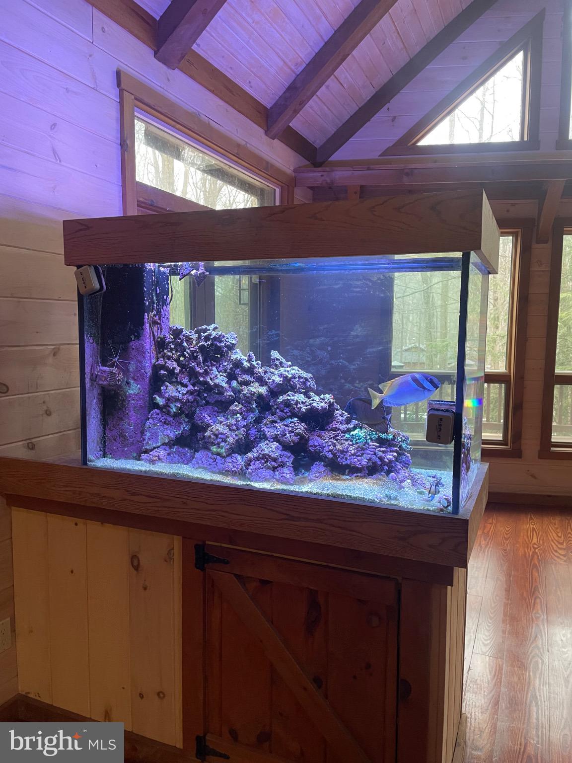 506 Hemlock Lane Lebanon, PA 17042 - Photo 14 of 63 a wooden floor in a room with a table and chairs