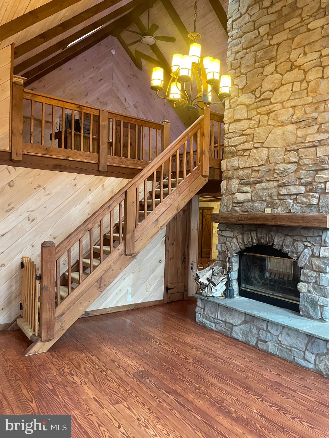 506 Hemlock Lane Lebanon, PA 17042 - Photo 15 of 63 a view of staircase with furniture and a fireplace