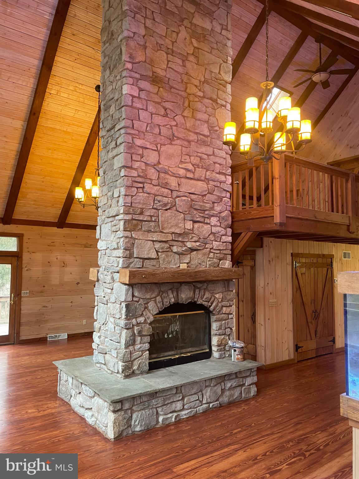 506 Hemlock Lane Lebanon, PA 17042 - Photo 17 of 63 a fireplace with wooden floor