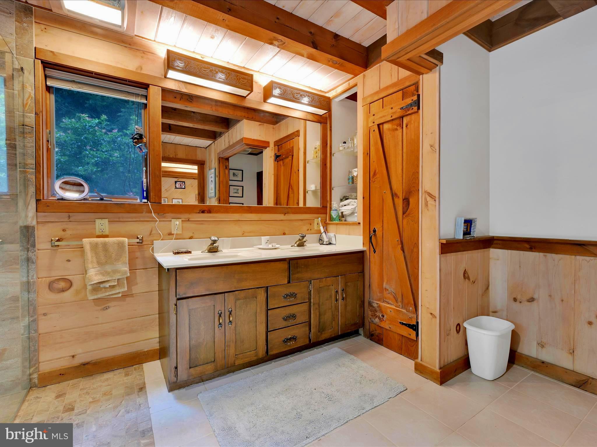 506 Hemlock Lane Lebanon, PA 17042 - Photo 25 of 63 a bathroom with a granite countertop sink and a mirror