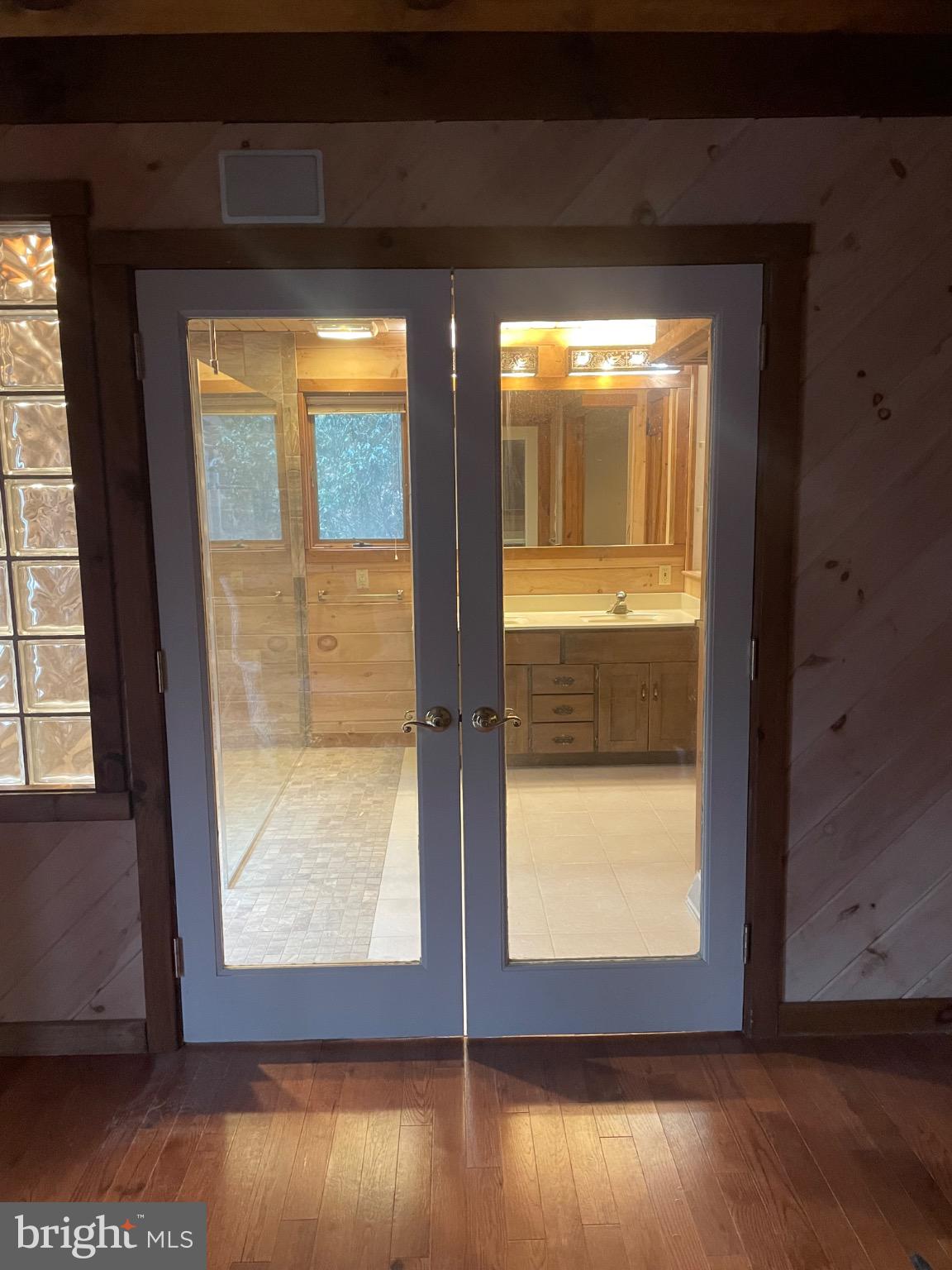 506 Hemlock Lane Lebanon, PA 17042 - Photo 28 of 63 a view of an empty room with wooden floor and a window