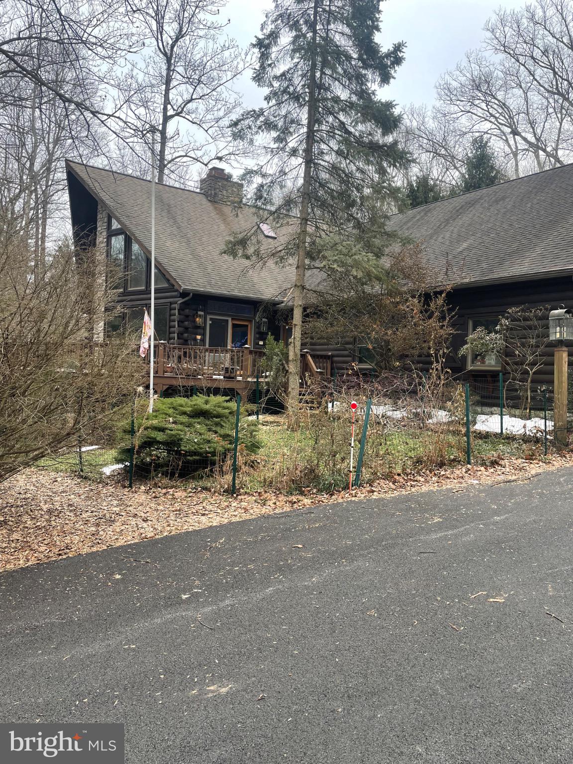 506 Hemlock Lane Lebanon, PA 17042 - Photo 3 of 63 a view of a brick house with many windows next to a road