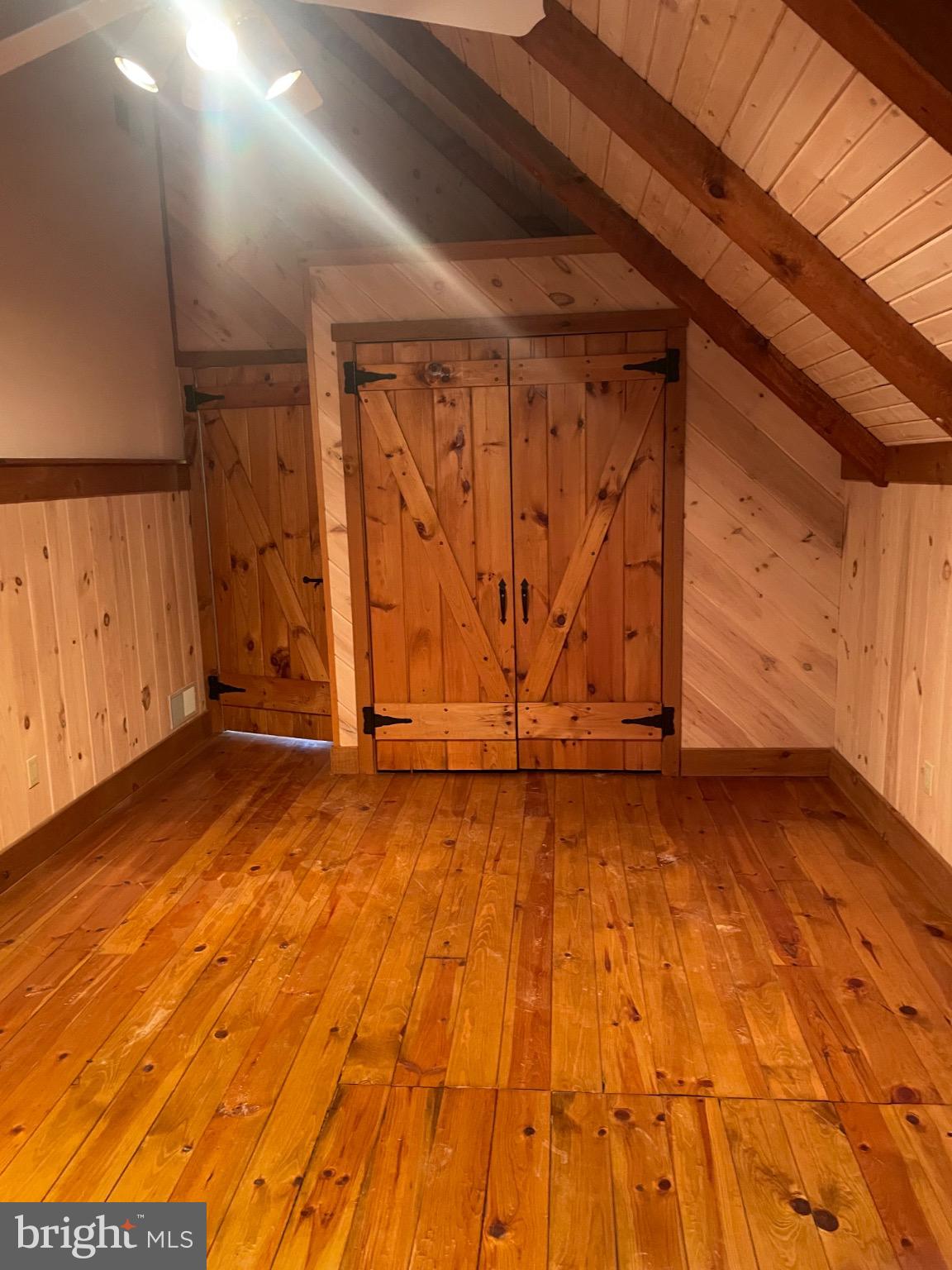 506 Hemlock Lane Lebanon, PA 17042 - Photo 32 of 63 a view of an empty room with wooden floor