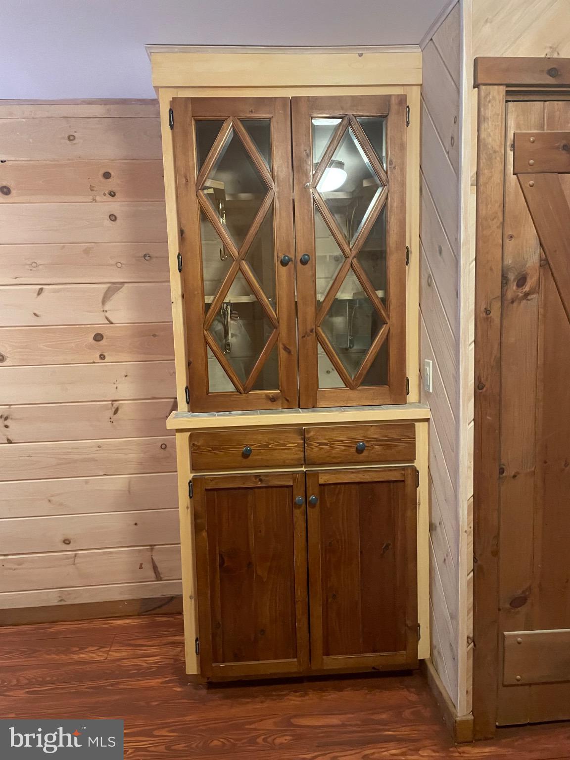 506 Hemlock Lane Lebanon, PA 17042 - Photo 38 of 63 a view of an empty room with wooden floor and a door