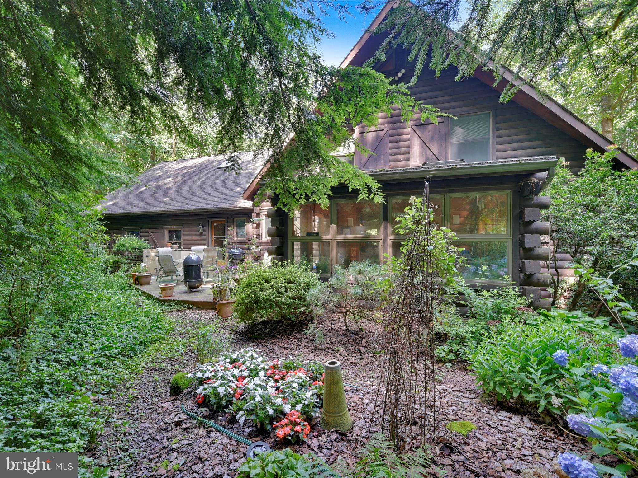 506 Hemlock Lane Lebanon, PA 17042 - Photo 43 of 63 a view of a house with a garden and plants