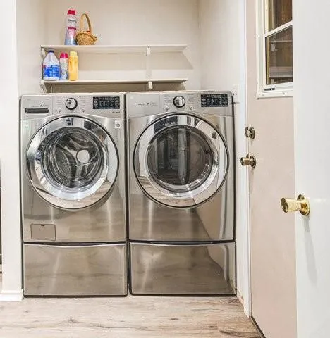 a utility room with dryer and washer