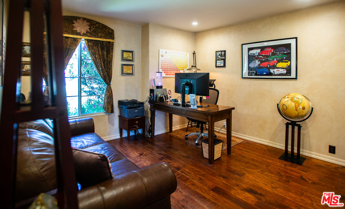 969 Vintage Way Los Alamos, CA 93440 - Photo 20 of 59 a living room with furniture a table and a large window