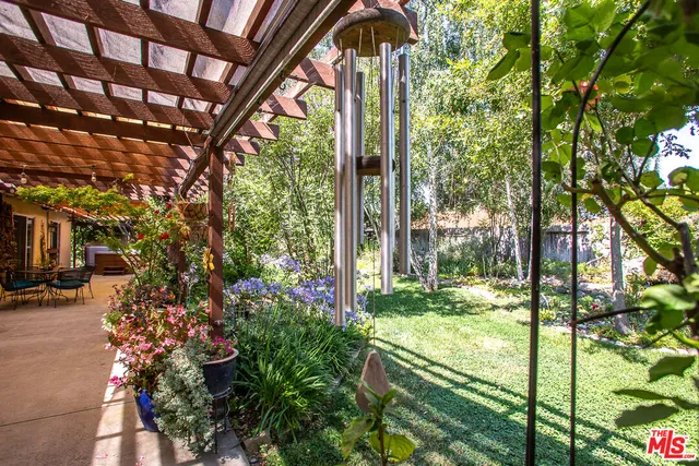 a view of balcony with wooden floor