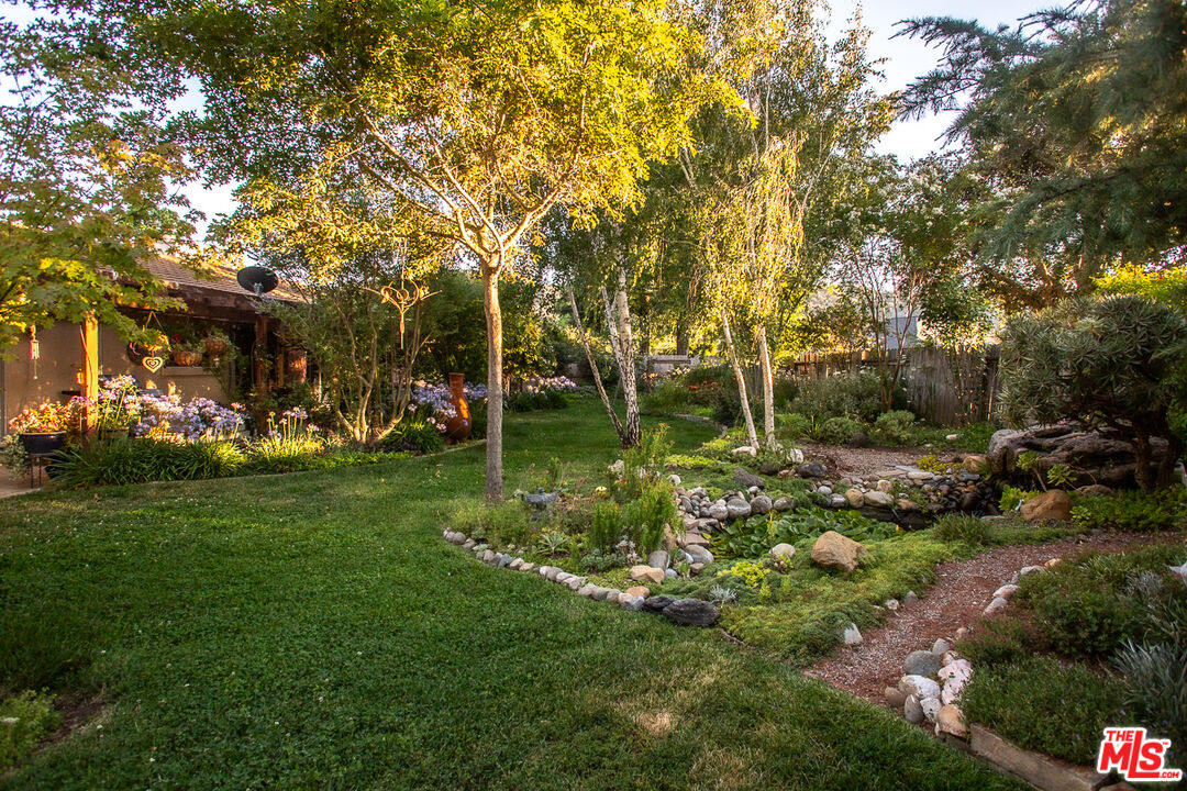 969 Vintage Way Los Alamos, CA 93440 - Photo 50 of 59 a view of yard with swimming pool and green space