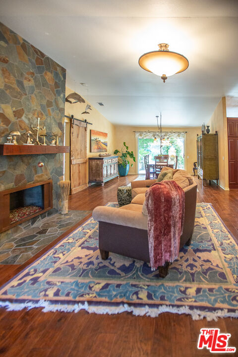 969 Vintage Way Los Alamos, CA 93440 - Photo 6 of 59 a living room with fireplace furniture and a fireplace