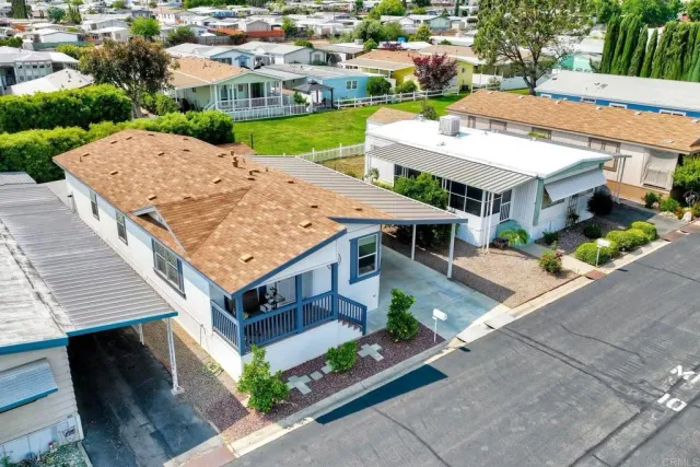 an aerial view of a house with a garden