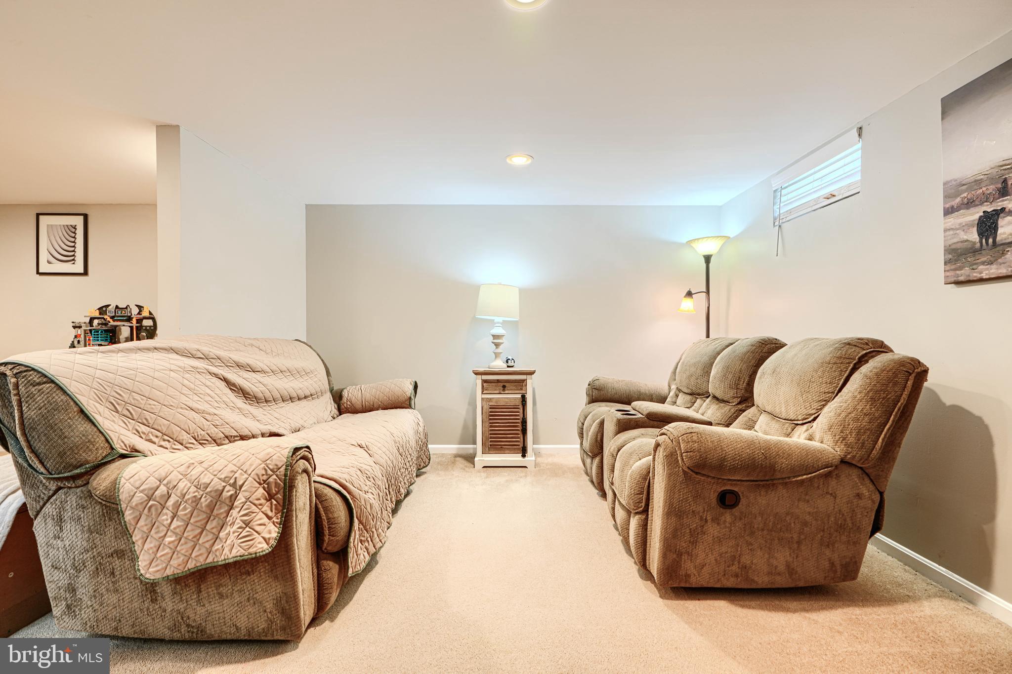 1026 Prospect Mill Road Bel Air, MD 21015 - Photo 26 of 38 a bedroom with two beds and a couch