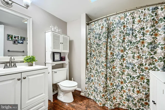 a bedroom with two beds and a couch