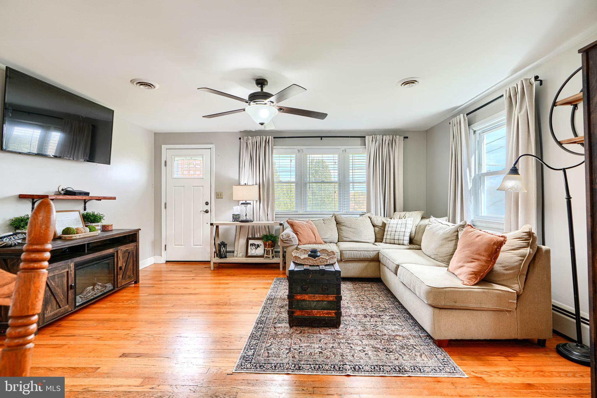 1026 Prospect Mill Road Bel Air, MD 21015 - Photo 6 of 38 a living room with furniture and a flat screen tv