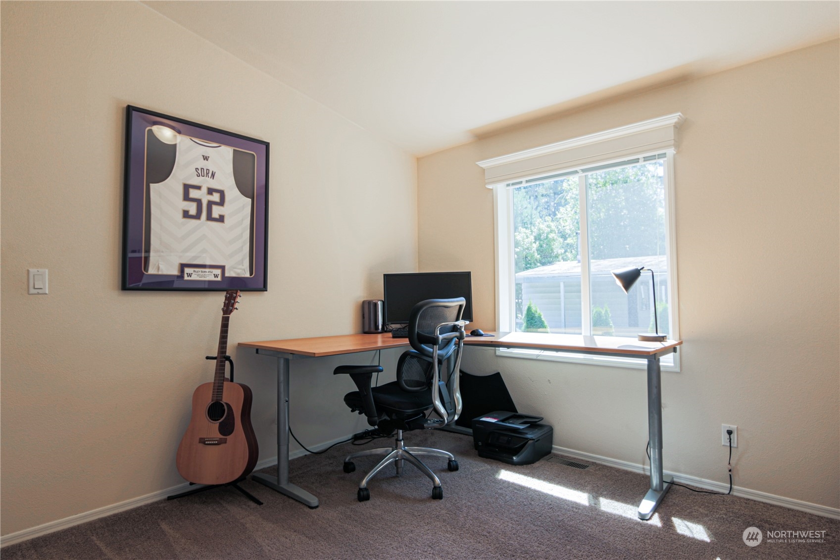 20426 32nd Drive Southeast Bothell, WA 98012 - Photo 14 of 23 a view of a workspace with furniture and a window