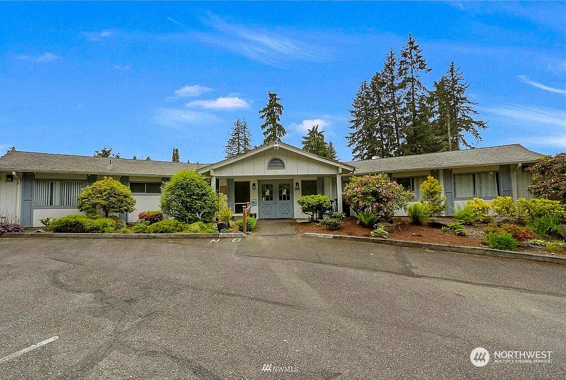 20426 32nd Drive Southeast Bothell, WA 98012 - Photo 22 of 23 a front view of a house with garden
