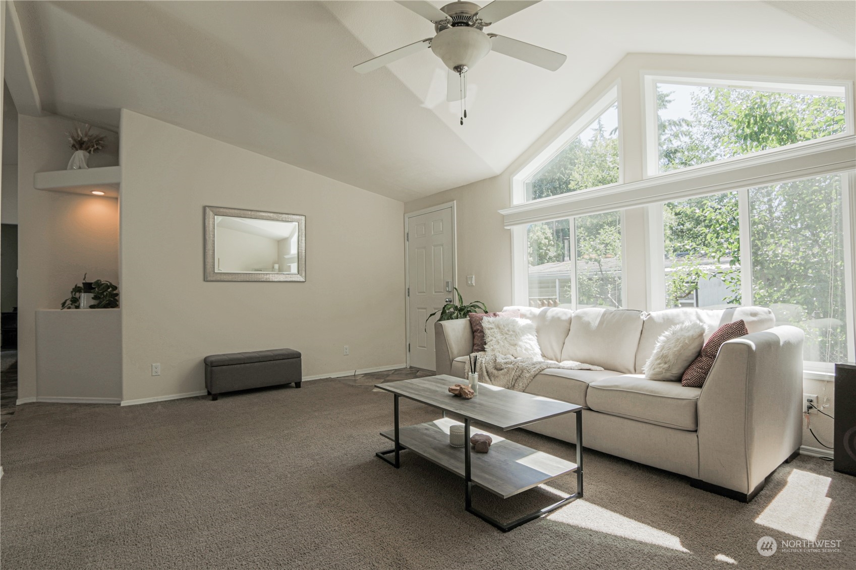 20426 32nd Drive Southeast Bothell, WA 98012 - Photo 4 of 23 a living room with furniture and a large window