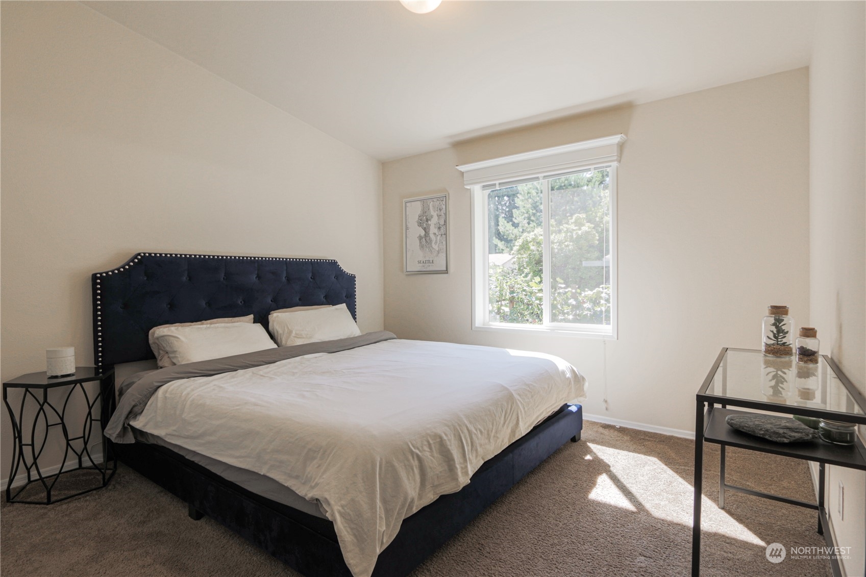 20426 32nd Drive Southeast Bothell, WA 98012 - Photo 9 of 23 a bedroom with a bed and a window